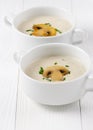 Mushroom cream soup on white wooden boards Royalty Free Stock Photo