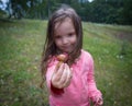 Girl with mushroom in the hands