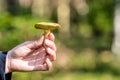 Mushroom picker with a mushroom in autumn