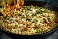 Mushroom Risotto in iron pan with herbs and parmesan cheese Royalty Free Stock Photo