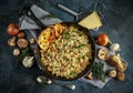 Mushroom Risotto in iron pan with herbs and parmesan cheese Royalty Free Stock Photo