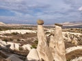 Fairy chimneys rocks at the valley near Urgup, Cappadocia, Turkey Royalty Free Stock Photo