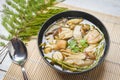 Mushroom soup bowl - Yellow wild mushroom or grisette Amanita hemibapha vaginata edible mushrooms cooked Asian food Royalty Free Stock Photo