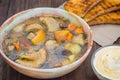 Mushroom soup with cream. Wooden background. Top view