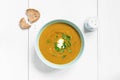 Mushroom soup garnished with fresh parsley on white table Royalty Free Stock Photo