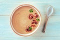 Mushroom soup, garnished with parsley, overhead shot on a wooden background Royalty Free Stock Photo