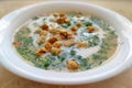 Mushroom soup puree with croutons and dill in a white plate Royalty Free Stock Photo