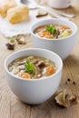 Mushroom soup on a rustic wooden table Royalty Free Stock Photo