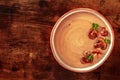 Mushroom soup, shot from above on a dark rustic wooden background Royalty Free Stock Photo