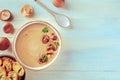 Mushroom soup with various mushrooms and toasted bread, overhead shot Royalty Free Stock Photo