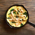 Mushroom and spinach frittata with shrimps Royalty Free Stock Photo