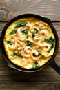 Mushroom and spinach frittata with shrimps Royalty Free Stock Photo