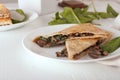 Mushroom spinach quesadilla on white plate Royalty Free Stock Photo