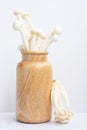 Mushrooms conceptual still life. White beech or shimeji mushrooms in wooden vase