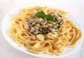 Mushrooms in cream on fettuccini Royalty Free Stock Photo