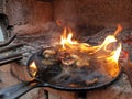 mushrooms in a frying pan on fire