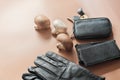mushrooms and gloves, phone case and key holder on beige background. mycelium leather, vegan leather concept
