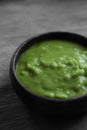 Mushy peas in a wooden bowl Royalty Free Stock Photo