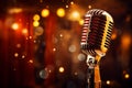 Music background with spot lighting, featuring a retro microphone on stage