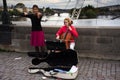 Music band of Czech women musician people playing music instrument violin and Violoncello or Cello for show people and travelers