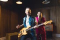 Music band having a rehearsal in a studio Royalty Free Stock Photo