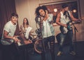 Music band performing in a studio Royalty Free Stock Photo