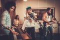 Music band performing in a studio Royalty Free Stock Photo