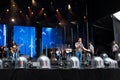 Music band on stage at an outdoor public concert in Montreal, Quebec, Canada