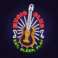 Music club neon poster, banner. Neon sign, emblem, bright signboard, light banner with classical acoustic guitar. Vector Royalty Free Stock Photo