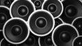 Multiple various size black sound speakers background. 3d illustration