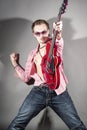 Music Concept: Portrait of Expressive Caucasian Male Guitarist P