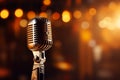 Music concept Retro microphone on stage with bokeh background Royalty Free Stock Photo