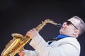 Music Concepts. Expressive Mature Playing Saxophonist Posing In