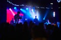 Music Concert background blur. Blurred People dancing with original bokeh lights in background - Defocused image for an Royalty Free Stock Photo