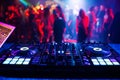 music controller DJ mixer in a nightclub at a party Royalty Free Stock Photo