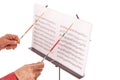 Music director with baton and sheet stand Royalty Free Stock Photo