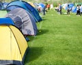 Music festival, camping and tents in park with people in summer, holiday or field at concert in countryside. Camp, site Royalty Free Stock Photo