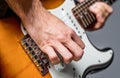 Music festival. Man playing guitar. Close up hand playing guitar. Musician playing guitar, live music. Musical