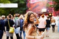 Music, festival and portrait of woman at a concert, field with crowd and audience or excited fan at event. Happy, girl Royalty Free Stock Photo