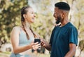 Music, fitness and running with a diversity couple outdoor in park for exercise or training together. Fitness, phone and