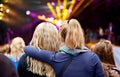 Music, friends and party with women at festival for celebration, rave culture and performance. Carnival, summer and Royalty Free Stock Photo