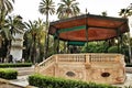 Music kiosk in the municipal park of Elche between palm trees