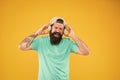 Music library. Feel rhythm. Bearded guy enjoy music. Equalizer player settings. Lifestyle music fan. Man listening music Royalty Free Stock Photo