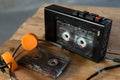 Music listening concept. Vintage cassette tape, audio player and headphones Royalty Free Stock Photo
