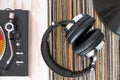 Music loverÃ¢â¬â¢s gear: turntable, headphones, and colorful record stack Royalty Free Stock Photo