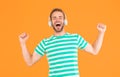 Music makes me happy. Happy man listen to music yellow background. Handsome guy enjoy melody playing in headphones