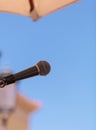 Music microphone against a blue sky Royalty Free Stock Photo