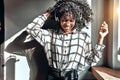 Music is my life!Young beautiful african american woman listening to music on headphones Royalty Free Stock Photo