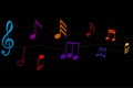 Music notes. Dark music background. Colorful abstract music notes on line wave background Royalty Free Stock Photo