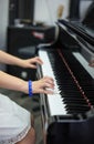 Music performer& x27;s hand playing the piano